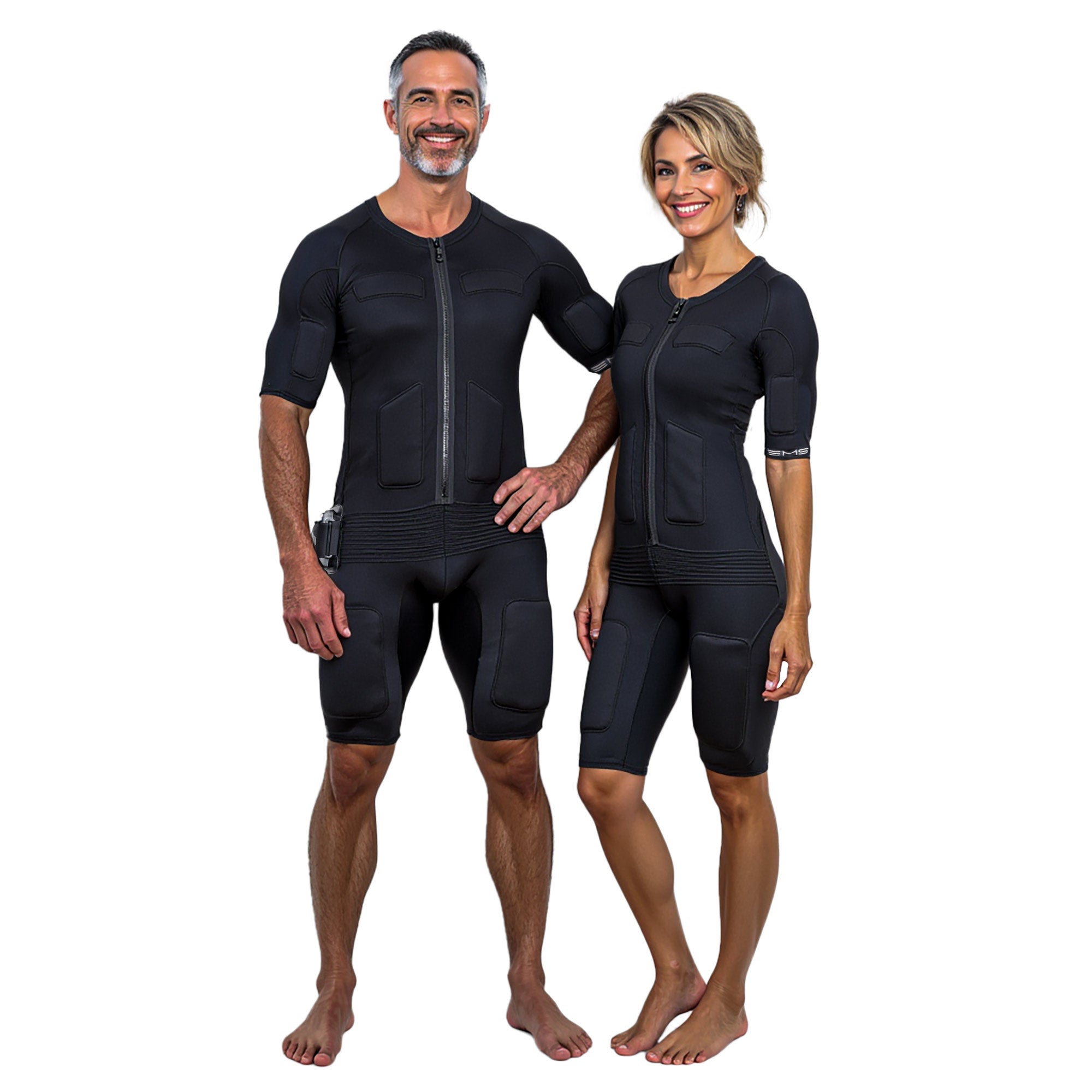 Smiling man and woman in matching black EMS suits with electrode pads and front zippers