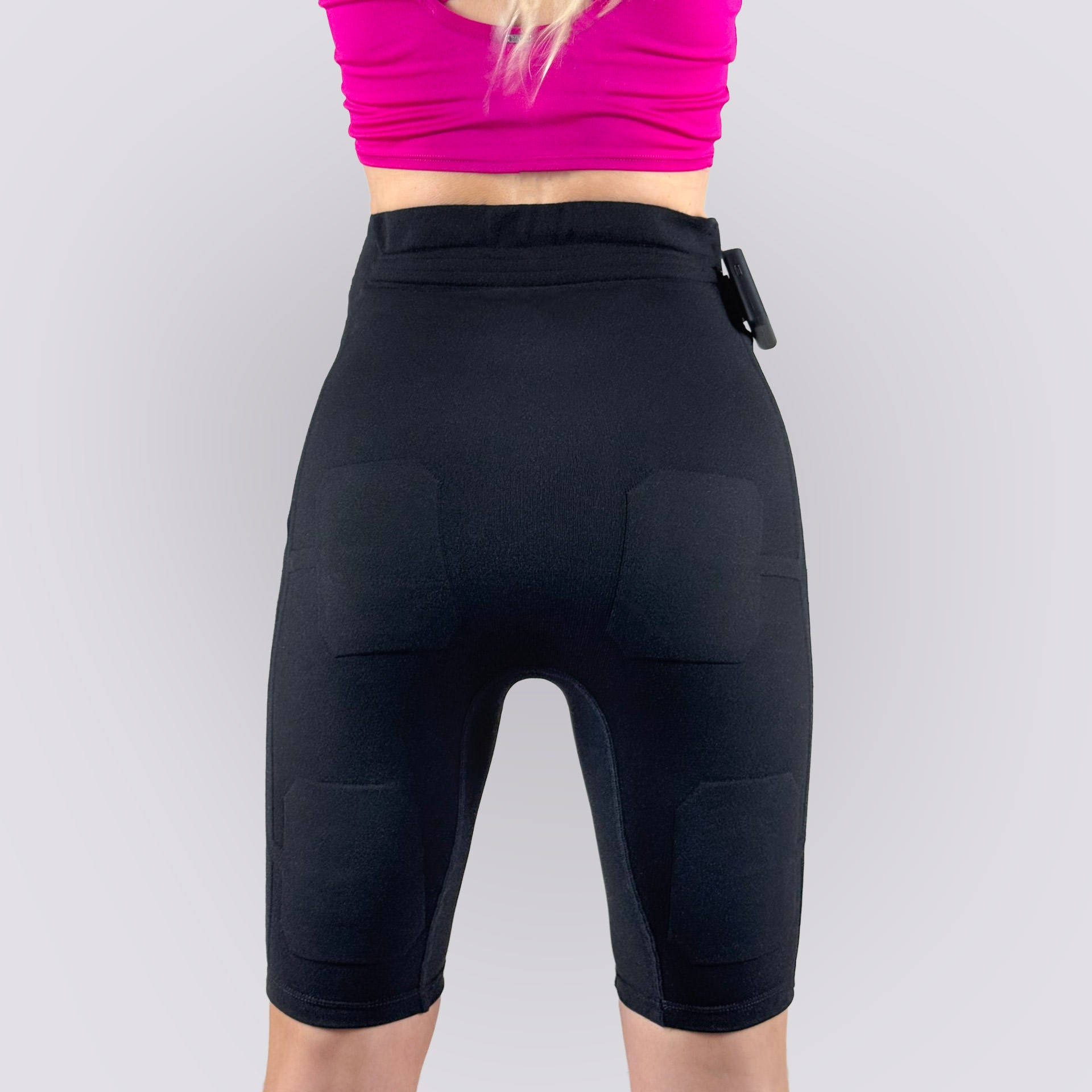 Back view of EMS PRO ONE shorts showing electrode zones and compact fit design