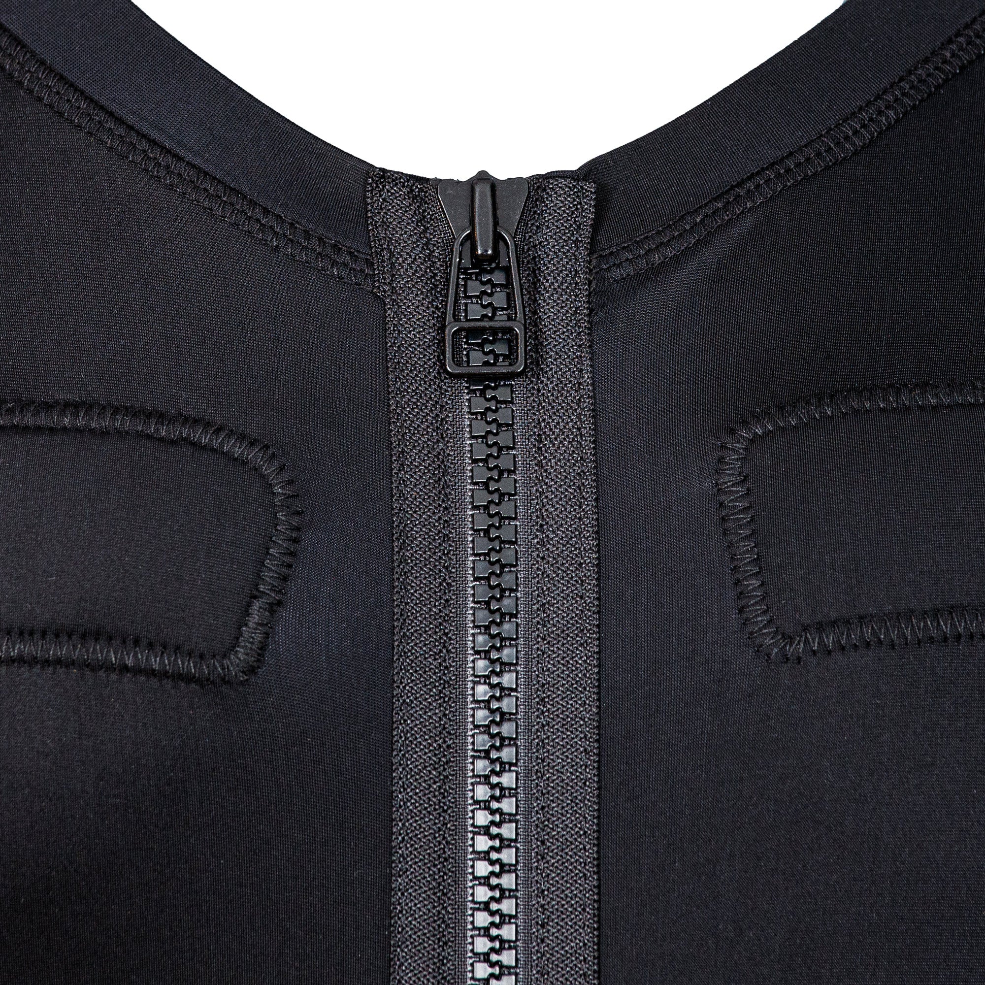 Close-up of heavy-duty black zipper on form-fitting EMS suit or athletic wear